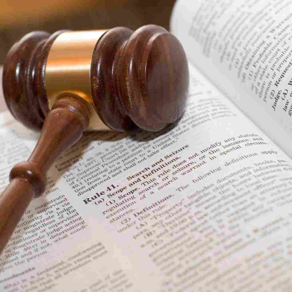 A lawyer and client shaking hands