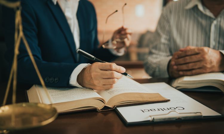 Criminal defense attorney working with defendant