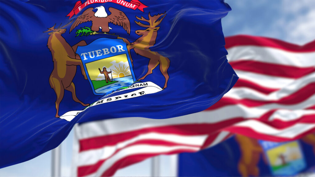 michigan state flag and american flag